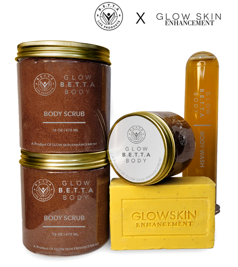 Glow B.E.T.T.A. Body scrub and body wash with gold lid, and soap on a white background with logos Glow Skin Enhancement X BETTA Life Products